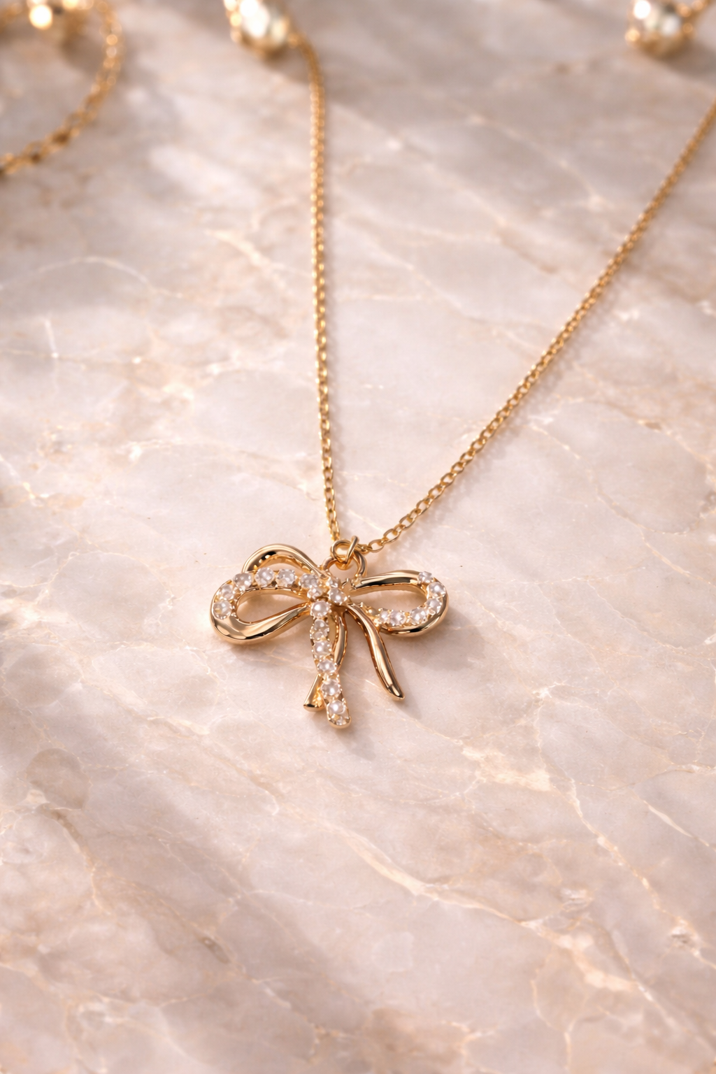 Rose Gold Bow Pendant Necklace – Elegant CZ Studded Stainless Steel Chain