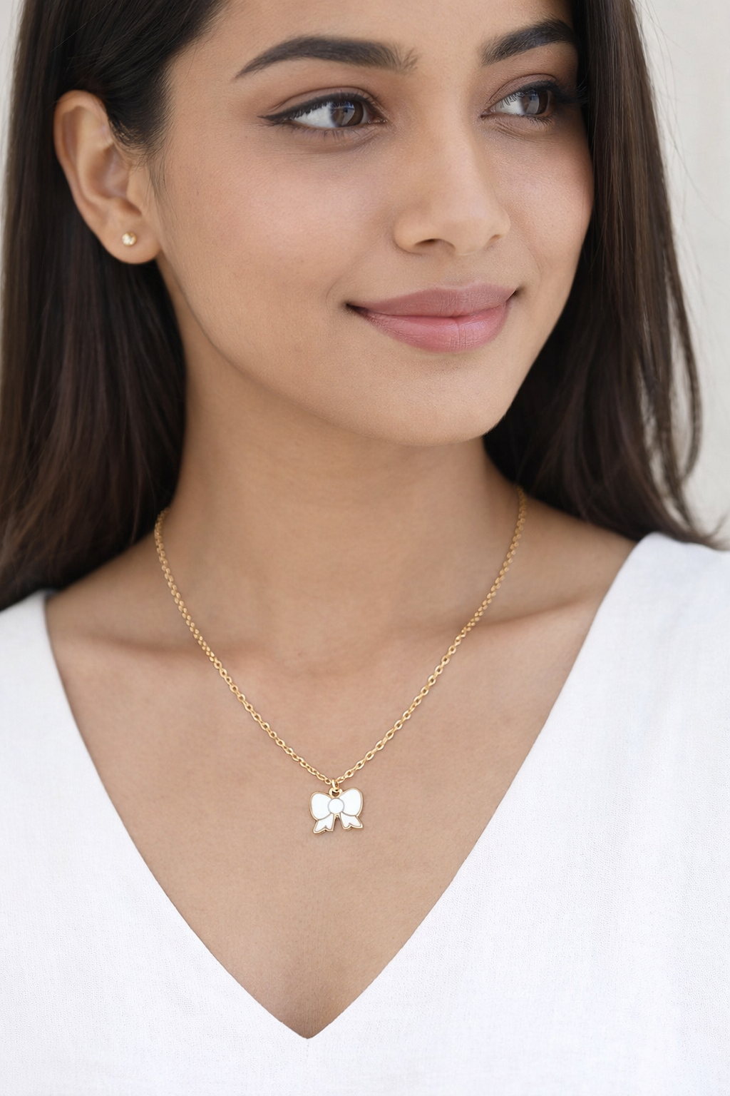 Elegant Bow Pendant Necklace Combo (Black & White) – Gold Plated Stainless Steel Chain Set for Women